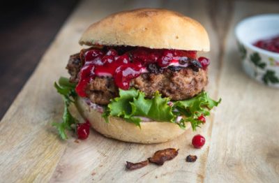 Moose burger with lettuce, lingonberry jam, sour cream, homemade bun and chantarelles.